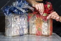 Glass Blocks With Christmas Ribbons And Lights Stock Image Image with measurements 1300 X 1070