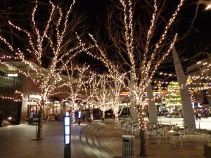 Outdoor Plaza Nighttime Scene With Skating Rink And Christmas Lights in proportions 4608 X 3456